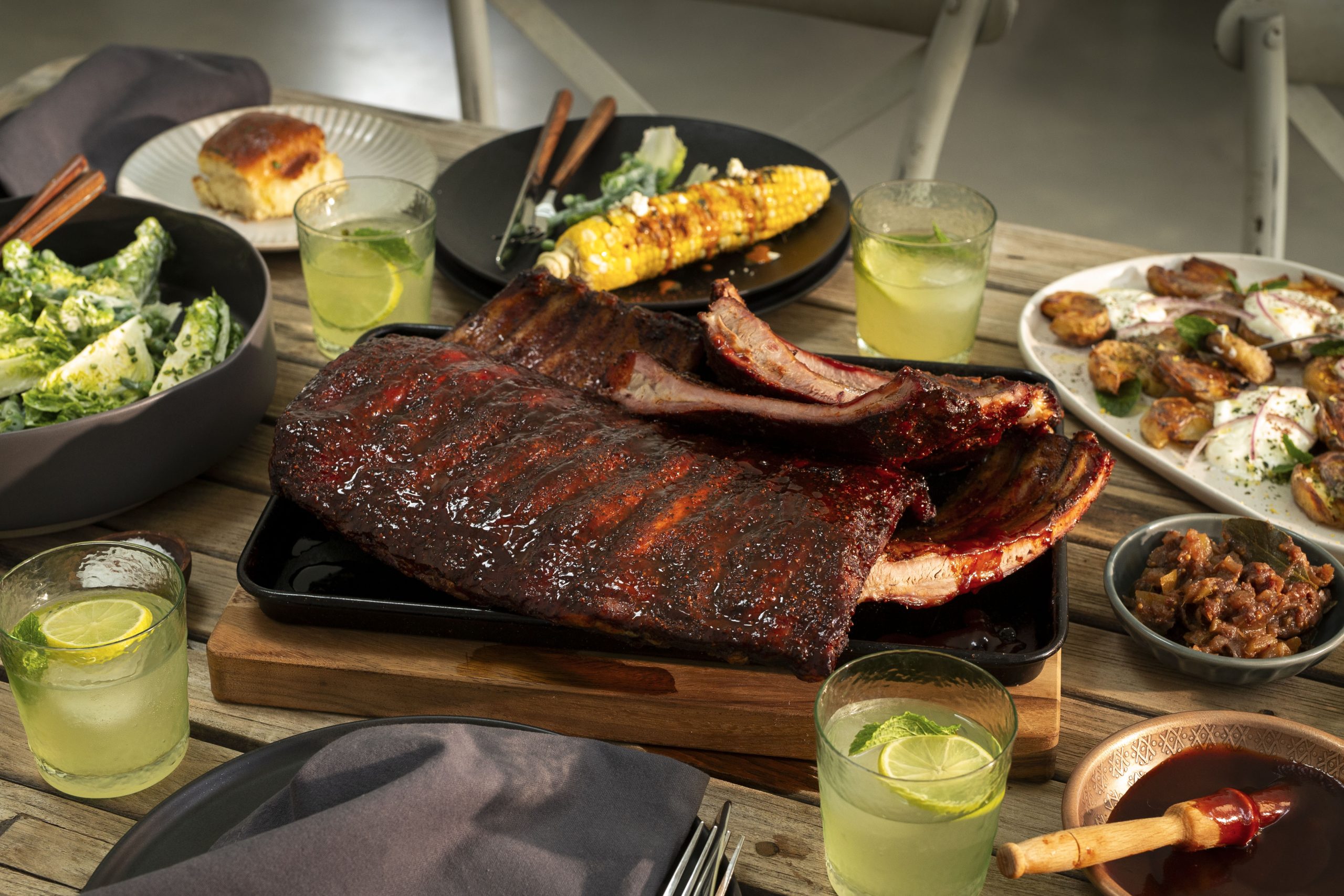 Full plate pork ribs served on metal tray